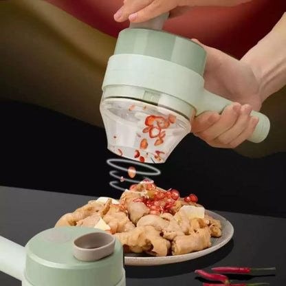 Electric cutter chopping vegetables in kitchen
