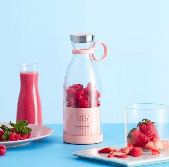 Portable blender making fresh smoothie
